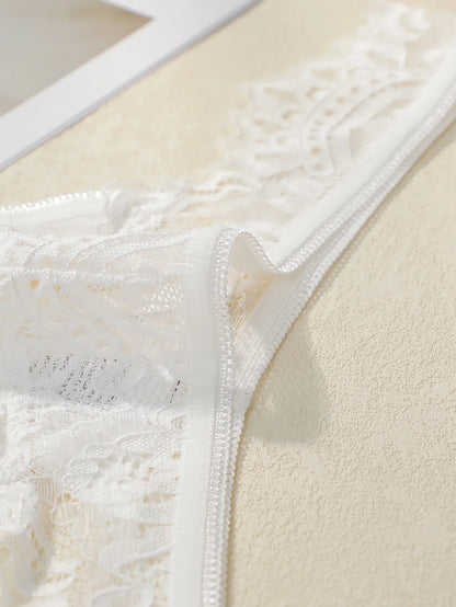 Women's low waisted lace thong with seamless hollow out lifting buttocks easy to wash and dry comfortable underwear C2324