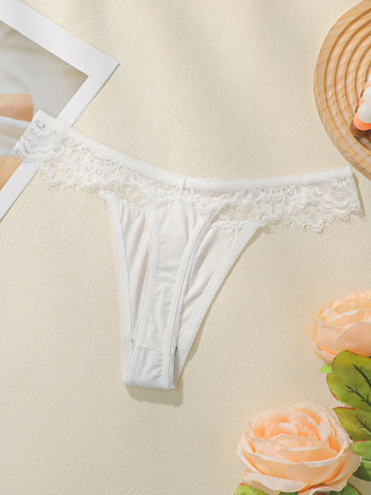 Women's low waisted lace thong with seamless hollow out lifting buttocks easy to wash and dry comfortable underwear C2324